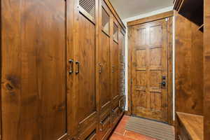 Entryway with tile patterned flooring