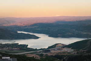 Aerial view at dusk of a water and mountain view