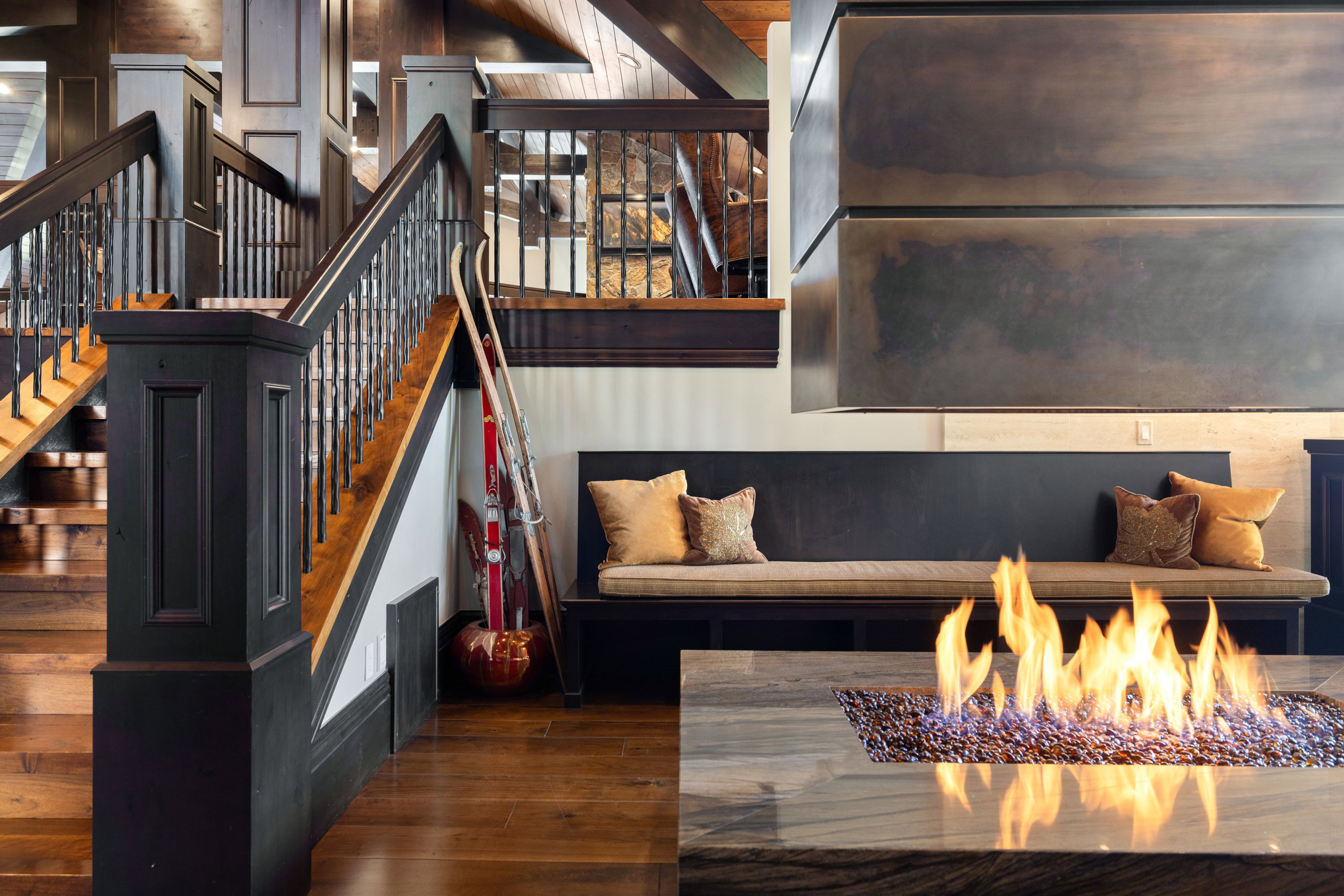 Staircase featuring wood finished floors