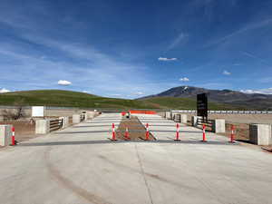 View of main entrance from the Range community.  Looking east