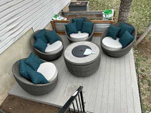 View of wooden balcony featuring a wooden deck