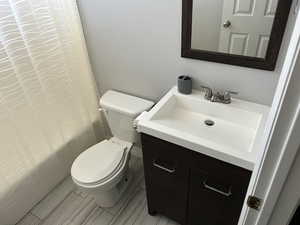 Full bathroom with vanity and a shower with curtain