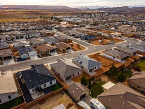 Aerial view of residential area with a mountainous background
