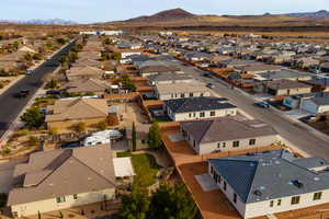 Aerial view of residential area with a mountain backdrop