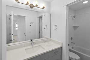 Full bath with  shower combination and vanity