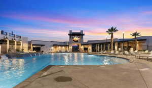 Community pool featuring a patio area