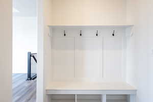 Mudroom featuring wood finished floors