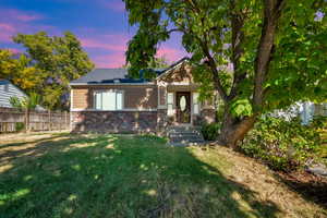 View of front facade with stone siding