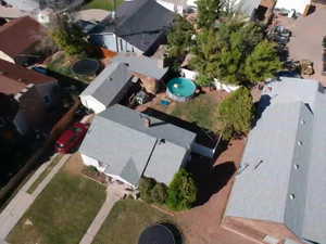 Aerial overview of property's location featuring a pool area