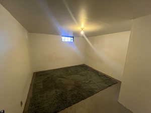 Bonus room with concrete flooring