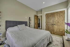 Bedroom featuring a closet and recessed lighting