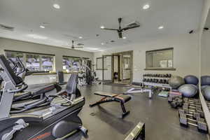 Gym with recessed lighting, plenty of natural light, and a ceiling fan