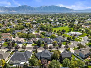 Aerial view of residential area featuring a mountain backdrop