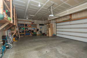 Garage featuring a garage door opener