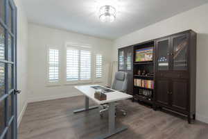 Office with baseboards and dark wood finished floors