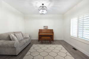 Living area featuring wood finished floors