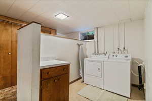 Laundry room with independent washer and dryer