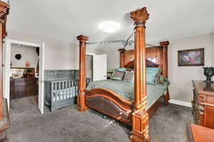 Bedroom with carpet and baseboards