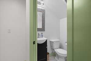 Bathroom with vanity and toilet