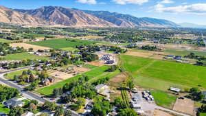 View of property location featuring a mountainous background and rural landscape