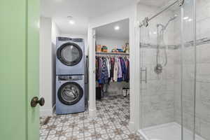 Laundry area with stacked washer / drying machine