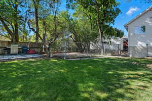 Fenced backyard featuring a patio area