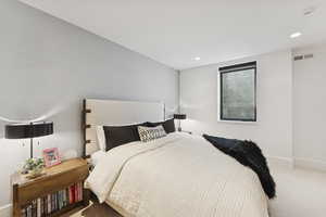 Bedroom featuring carpet and recessed lighting
