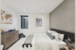 Bedroom with recessed lighting and carpet flooring