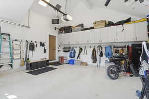 Garage featuring a garage door opener