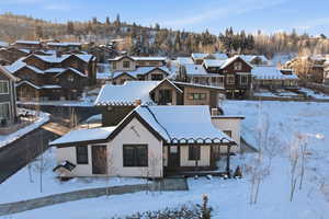 View of front of home with a residential view and a porch