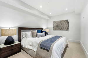 Bedroom with carpet floors and recessed lighting