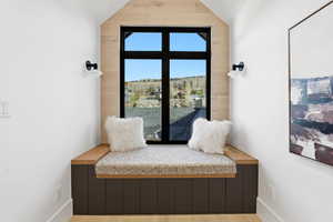 Living area with wood finished floors