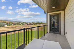 Balcony with a residential view and a mountain view