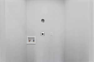 Washroom featuring washer hookup and hookup for an electric dryer