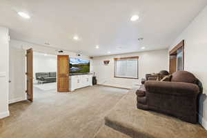 Theater with stepped seating and recessed lighting