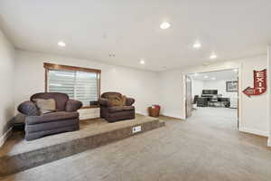 Theater with stepped seating and recessed lighting