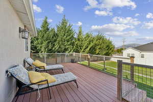 Large back deck and fenced backyard