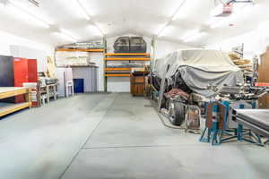 Detached Garage/Workshop- holds up to six cars. Has seven 220 volt outlets.