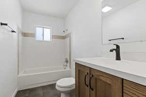 Full bathroom with shower / tub combination, vanity