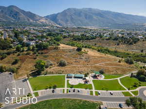 Aerial overview of property's location with a mountainous background