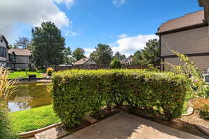 View of patio / terrace with a water view