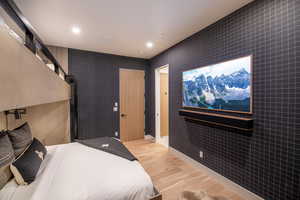 Bedroom with light wood-type flooring