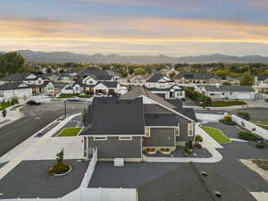 Aerial view at dusk of a residential view and a mountain view