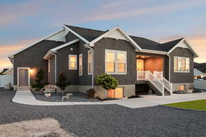 View of back of property with stucco siding