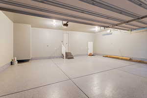 View of garage with expoxy flooring