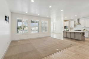 Great room blending into the kitchen and dining