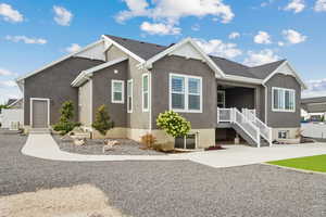 View of front of home featuring stucco siding