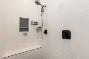 Bathroom view of tiled shower
