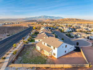 Aerial view of residential area featuring a mountainous background
