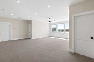 Carpeted empty room featuring recessed lighting and ceiling fan